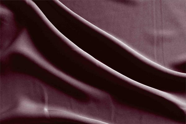 Tessuto microfibra poliestere fluida bordeaux per abbigliamento