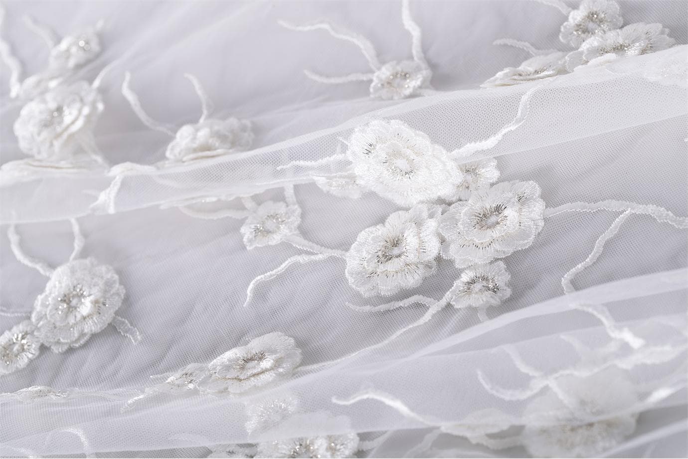 White embroidered tulle with ramage pattern | new tess bridal fabrics