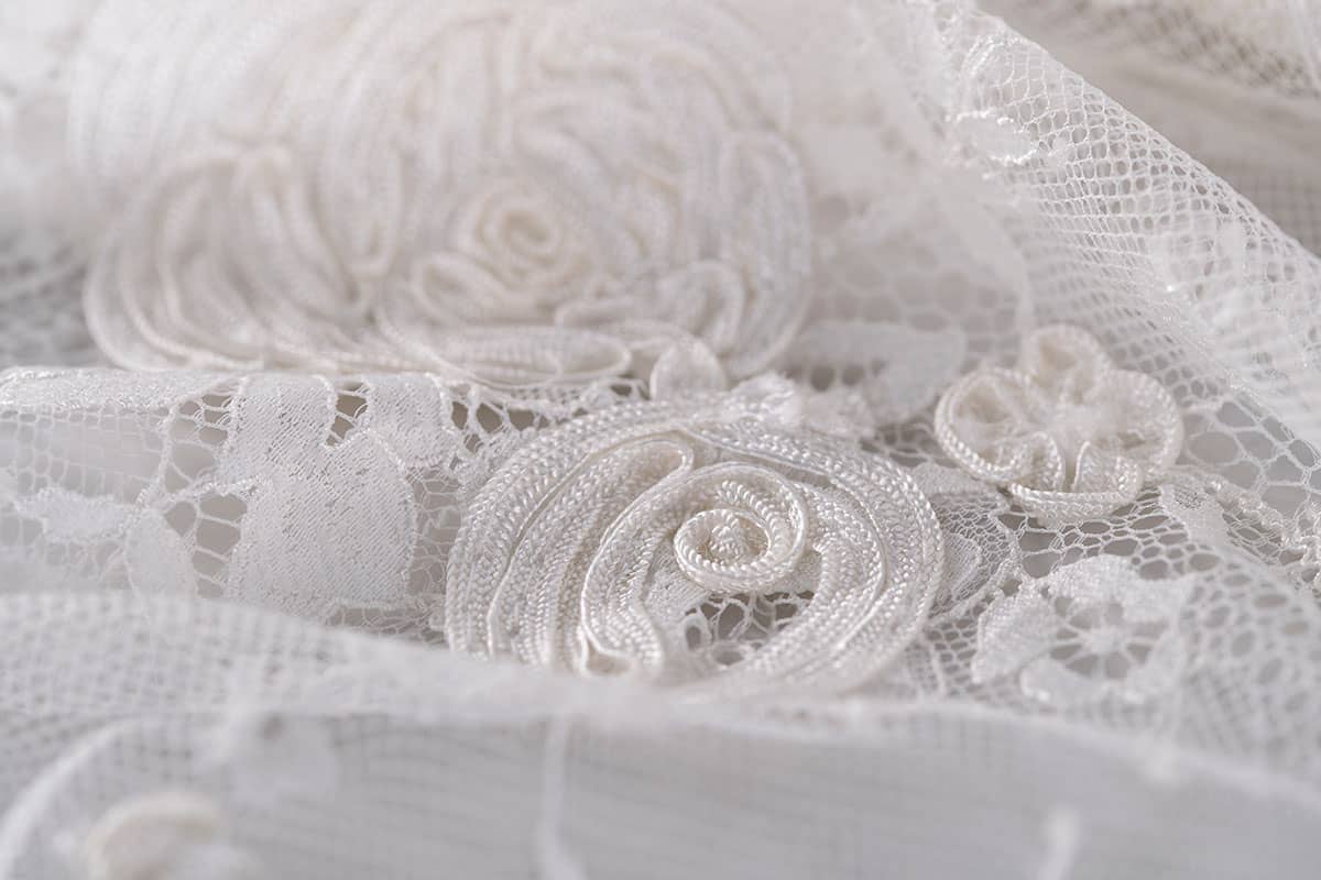 Ivory rebrodè lace with floral pattern | new tess bridal fabrics