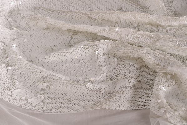Tessuto Paillettes Bianco in Poliestere per abbigliamento