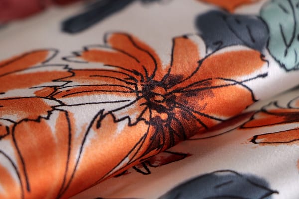 Brown, Orange, White Silk Crêpe Satin fabric for dressmaking