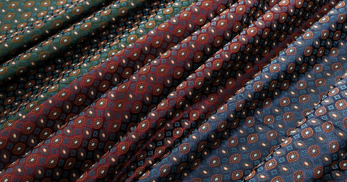 Fabrics with tie motif for women’s clothing