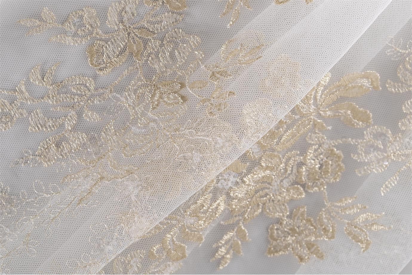 Luxurious gold embroidered tulle | new tess bridal fabrics