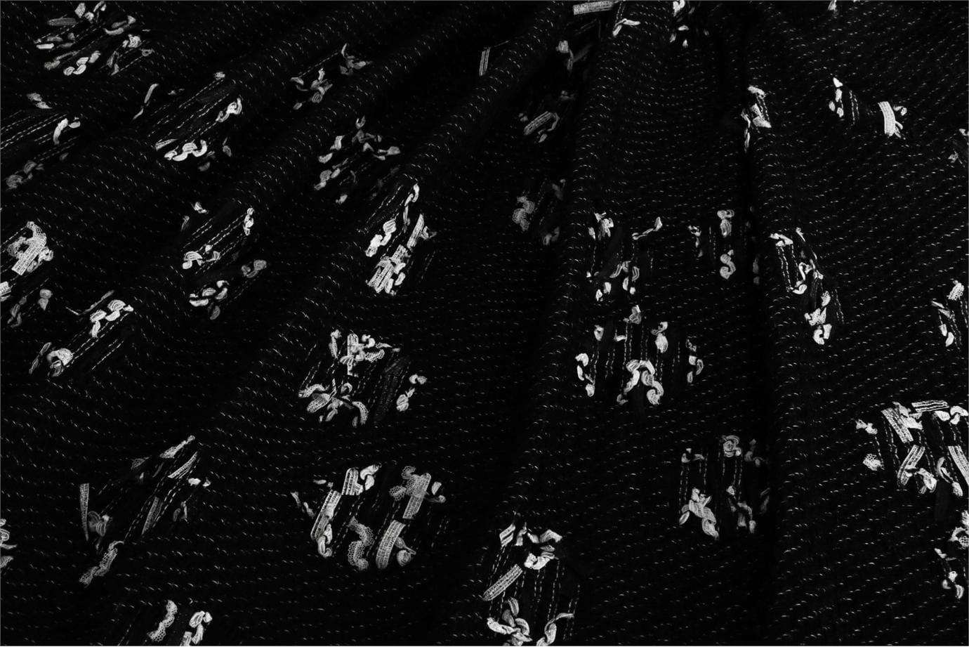 Black weaved fabric with micro dots pattern
