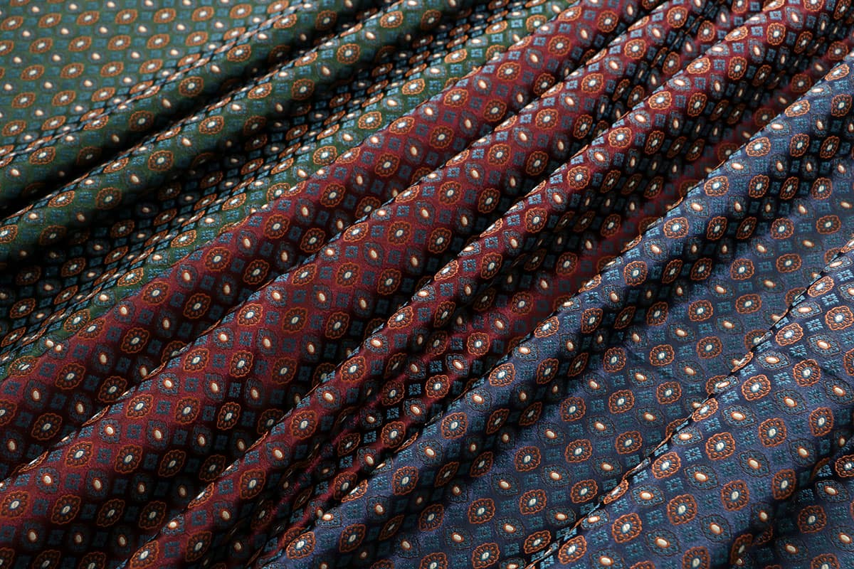 Fabrics with tie motif for women’s clothing
