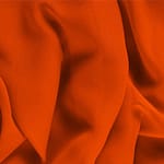 Tessuto Georgette Arancione Corallo in Seta per abbigliamento