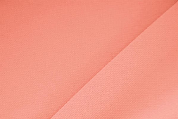Tessuto Microfibra Crêpe Arancione Salmone in Poliestere per abbigliamento