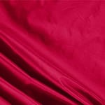 Tessuto Taffetà Rosso Rubino in Seta per abbigliamento
