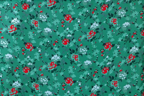Tessuto Mussola Verde in Viscosa per abbigliamento