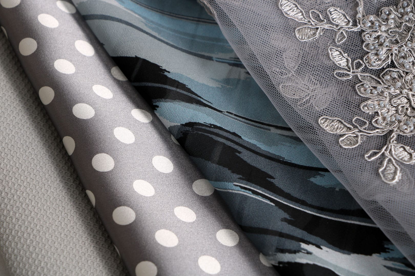 Tessuti grigio brillante per abbigliamento e moda | new tess