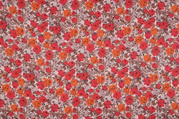Tessuto Crêpe Satin Arancione, Rosso in Seta per abbigliamento