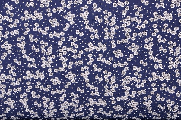 Floral cotton poplin fabric printed on a blue background | new tess