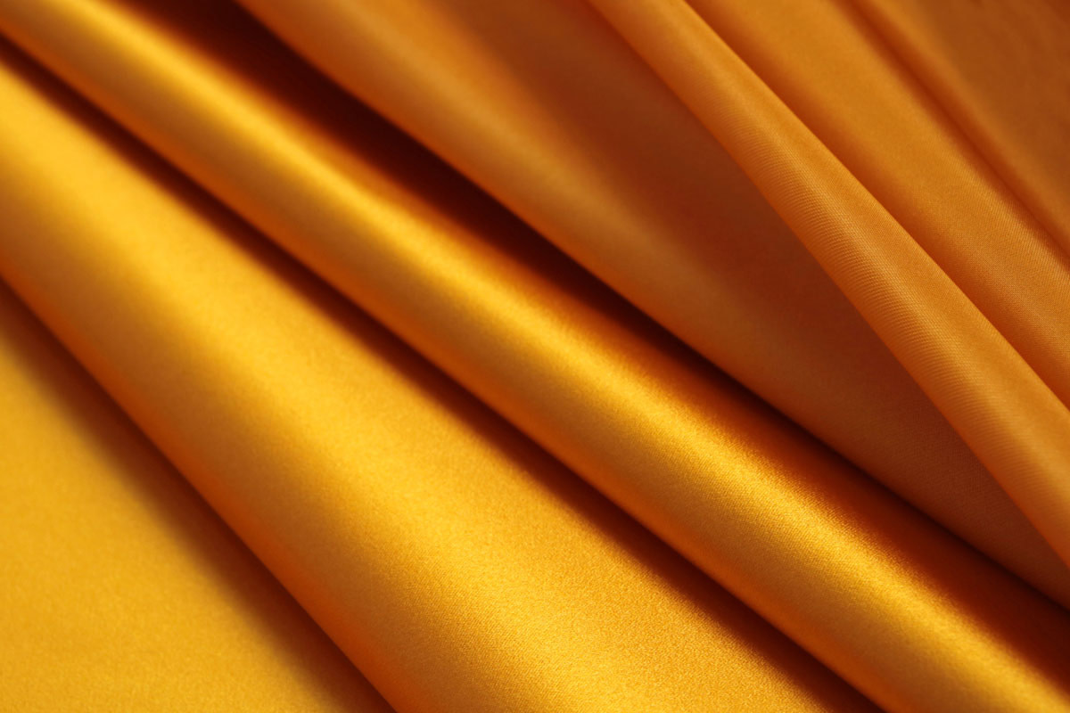 Tessuto giallo-arancio in duchesse e taffeta in pura seta | new tess