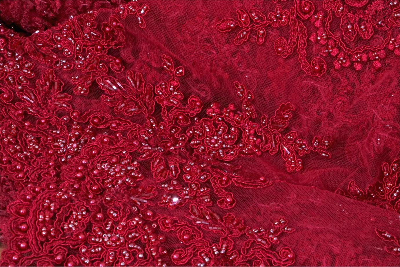 Tessuto Rebrode Perlinato 003 Rosso in Poliestere