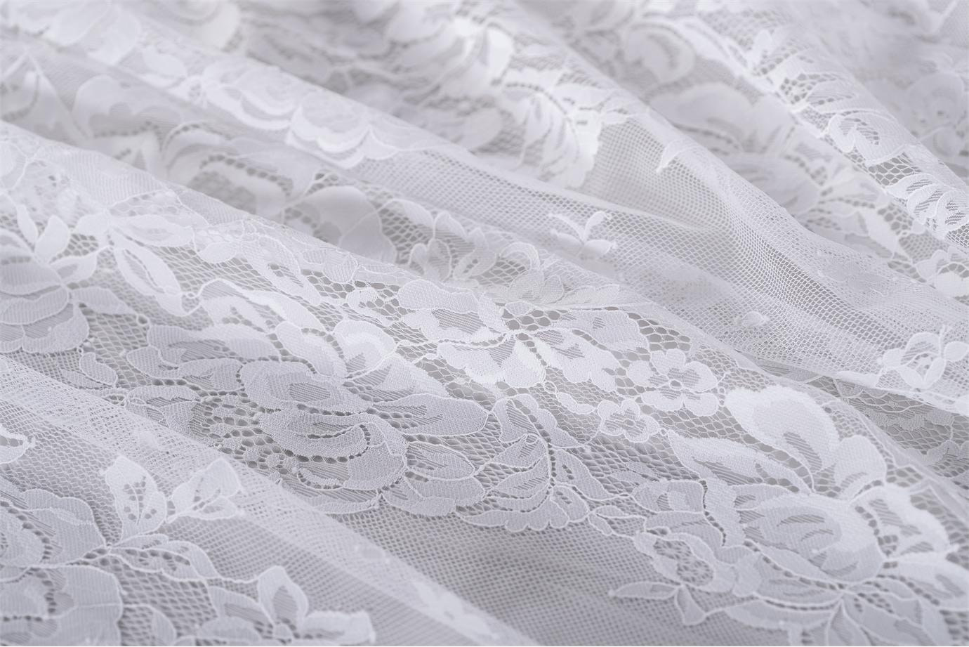 Dentelle avec double feston et motif floral | new tess