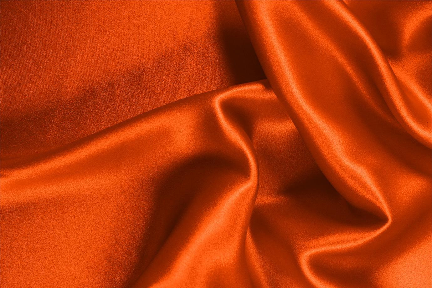 Tessuto Crêpe Satin Arancione Corallo in Seta per abbigliamento