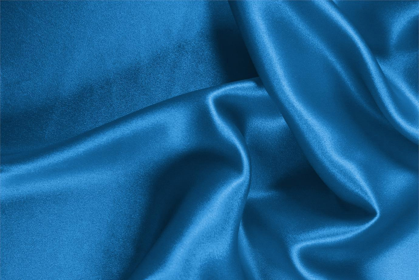 Tessuto Crêpe Satin Blu Portofino in Seta per abbigliamento