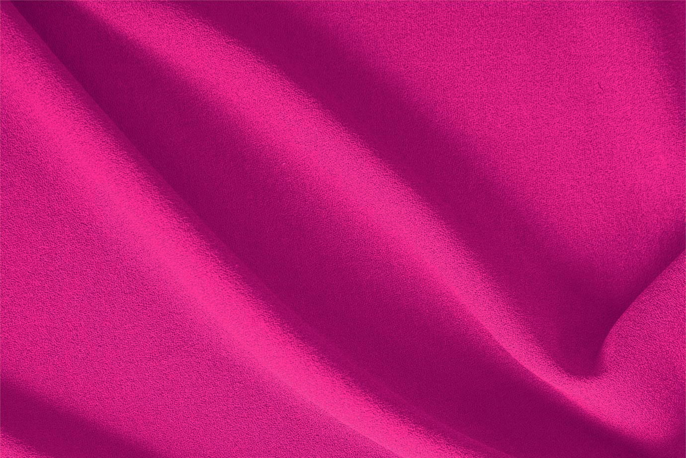 Cyclamen fuchsia wool crêpe fabric for dressmaking