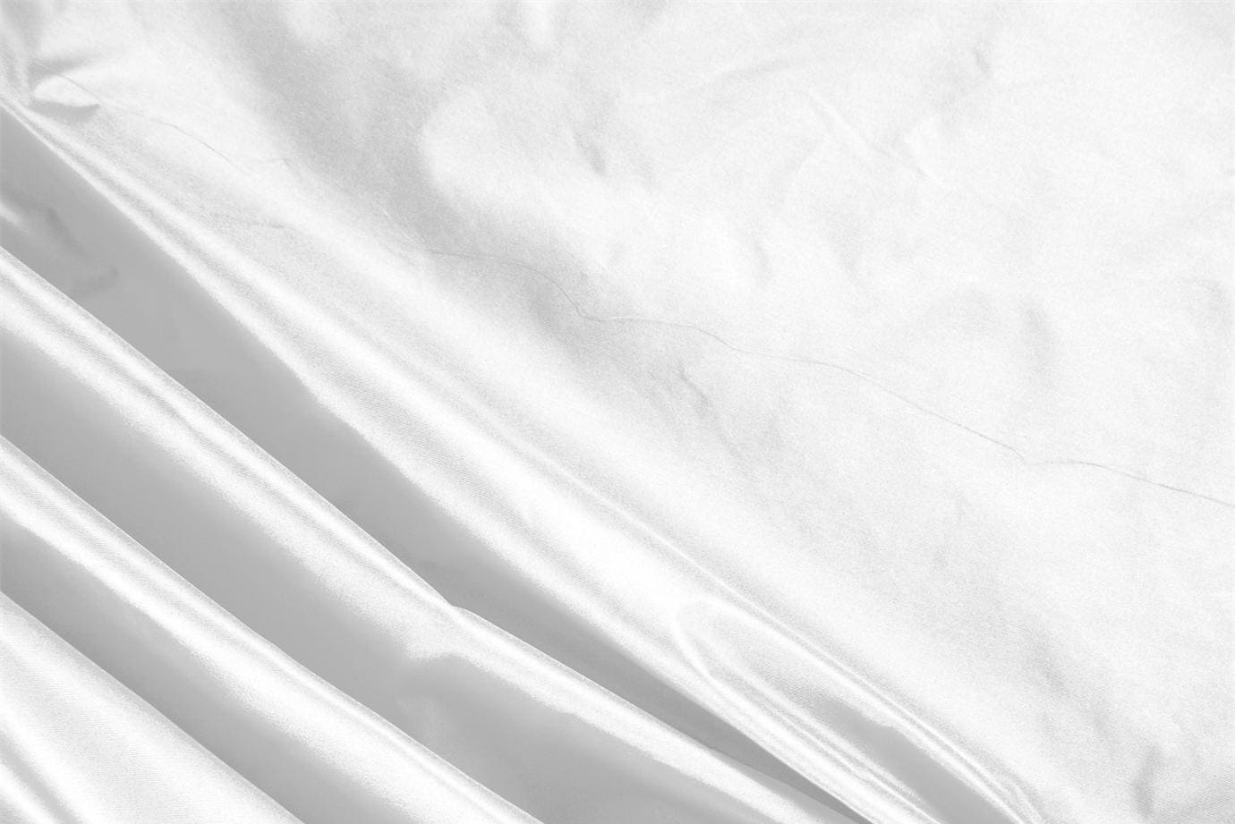 White taffeta fabric in pure silk for dressmaking