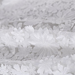 Magnificent white tulle with applied flowers | new tess bridal fabrics