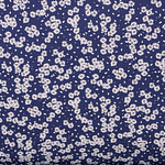 Tessuto floreale in popeline di cotone stampato su fondo blu | new tess