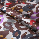 Viscose fil coupé fabric with a spotted print | new tess