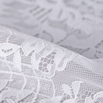 Dentelle avec double feston et motif floral | new tess