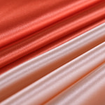 Orange crêpe silk satin fabric | new tess