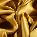 Oil yellow crêpe back satin fabric | new tess