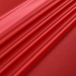 Tomato orange crêpe back satin fabric in pure silk | new tess