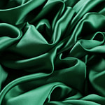 Emerald green crêpe back satin fabric | new tess