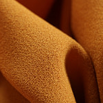 Ochre yellow wool crêpe fabric | new tess