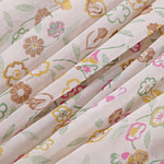 Silk georgette fabric printed in a multicoloured allover floral pattern on a ivory background | new tess