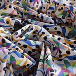 Cotton canvas fabric, printed with a multicoloured blue-ochre abstract design | new tess