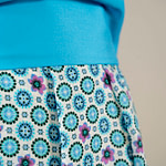 Viscose muslin fabric printed in a tie pattern in shades of turquoise | new tess