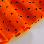 Orange polka dot silk satin fabric | new tess