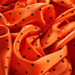 Orange polka dot silk satin fabric | new tess