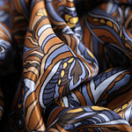 Silk satin fabric printed with a feather-effect pattern in shades of brown | new tess