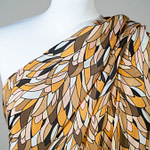 Beige leaves printed crepe de chine fabric | new tess