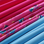 Floral fuchsia silk jacquard fabric paired with cotton sateen fabrics - new tess