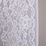 Tessuto pizzo rebrodé floreale bianco con doppio smerlo