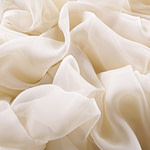 Tessuto Chiffon Primula Latte per Abbigliamento