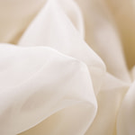 Tessuto Chiffon Primula Latte per Abbigliamento