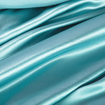 Light blue silk crêpe back satin fabric | new tess