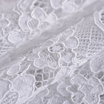 Tessuto pizzo rebrodé floreale bianco con doppio smerlo