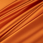 Persimmon orange crêpe back satin fabric | new tess