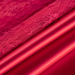 Ruby red chantilly lace and crêpe back satin fabric in pure silk | new tess