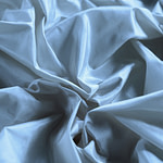 Light blue taffeta fabric in pure silk for dressmaking