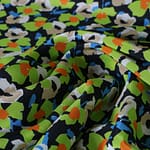 Black, Green, Orange Silk Crêpe de Chine fabric for dressmaking
