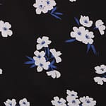 Tessuto floreale in popeline di cotone stampato su fondo nero | new tess